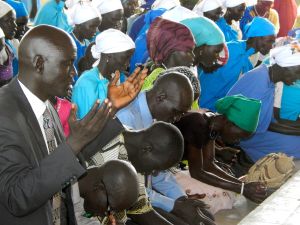 Nazarenes seek God in prayer at the front of the sanctuary in Gambella, Ethiopia